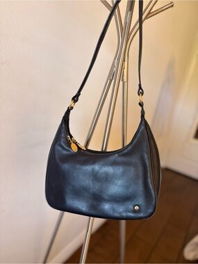 Sleek Black Leather Shoulder Bag with Gold Hardware